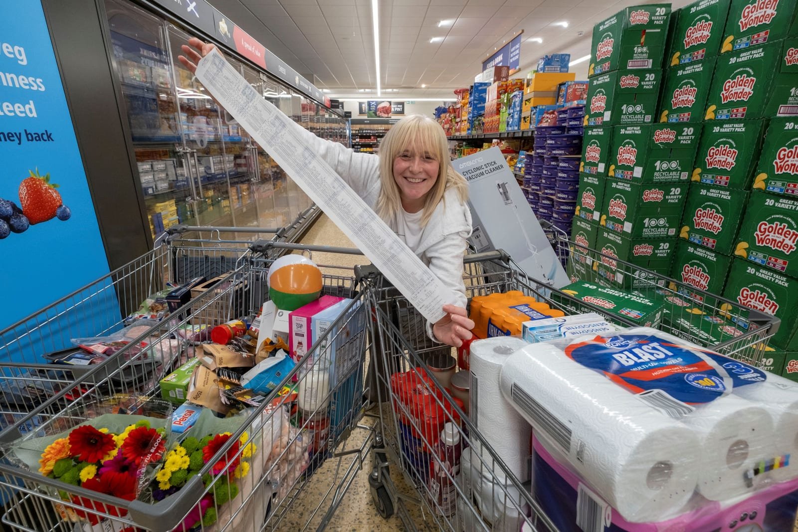 Carol McGlynn has raised £1,011.61 for Children’s Hospices Across Scotland (CHAS) while also taking home the same value in Aldi favourites (Credit: Port Glasgow)
